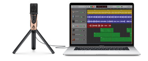 Microphone on tripod, connected to MacBook displaying audio mixing app.