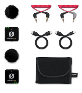 The RODE Wireless ME microphone system comes with transmitter and receiver, two furry windscreens, two coiled 3.5mm cables, two charge cables, and a convenient carry case for everything.