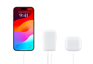 Belkin BoostCharge Dual Wall Charger in centre, cables connected, simultaneously charging iPhone on the left and AirPods case on the right