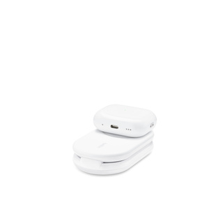 Socle de recharge magnétique pliable 2-en-1 BoostCharge de Belkin, plié à plat, boîtier d’AirPods en charge sur le dessus