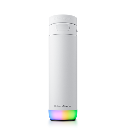 Gourde intelligente HidrateSpark PRO 2, face avant, coloris blanc, paille au sommet, grande poignée de transport, halo lumineux multicolore à 360° en dessous, logo HidrateSpark argenté en bas.