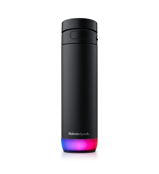 Vista frontal exterior de la botella inteligente PRO 2 de HidrateSpark en negro que muestra una pajita en la parte superior, asa grande, luz multicolor de 360 grados en la parte inferior y logotipo de HidrateSpark en plata en la parte inferior