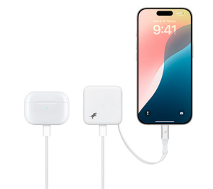 Nimble Wall Charger, centre, charging AirPods case at left via USB-C port and iPhone on the right via integrated USB-C cable