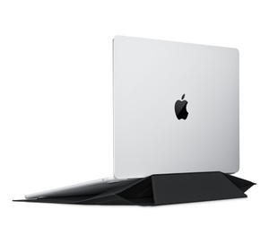MOFT Carry Sleeve, angled view, folded into adjustable low-viewing position, MacBook opened on on top in an angled view
