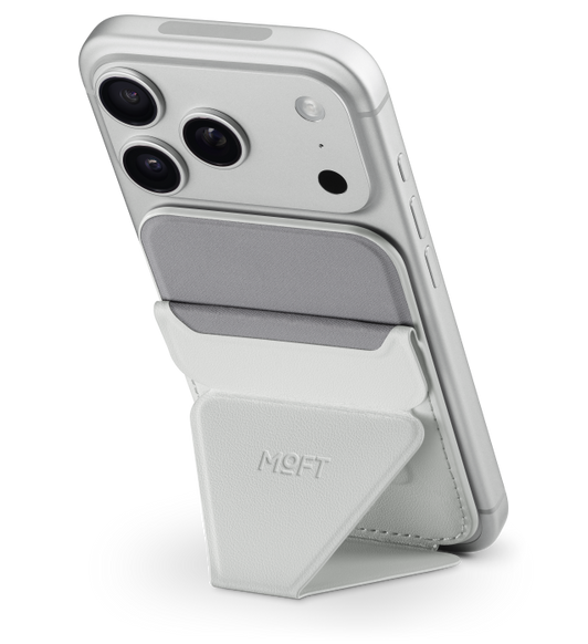 Moft MagSafe Wallet Stand, back exterior, gray color, iPhone attached, stand folded out to support it in portrait mode
