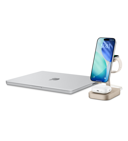 Mophie 4-in-1 Wireless Charge Stand, front exterior, champagne color, bottom exterior surface with AirPods case, top exterior surface with iPhone, rear exterior surface with Apple Watch, MacBook left exterior