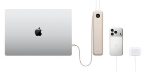 Belkin UltraCharge Pro 20K Power Bank at center, top exterior, sand color, integrated cable charging MacBook at left, iPhone and AirPods case and right