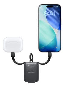 Twelve South Power Clip, front exterior, black colour, integrated USB‑C cables extended at either side charging AirPods case on left and iPhone on right