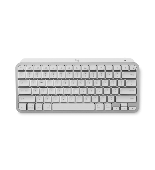 Logitech MX Keys Mini, top exterior, white keys, silver base, standard key layout with cursor movement keys at lower right, Logitech logo at top of keyboard