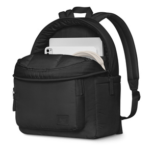 Herschel Cloudform Backpack XL, side exterior, black color, front zipper pouch open with iPad, MacBook, and AirPods Max inside, shoulder straps on back