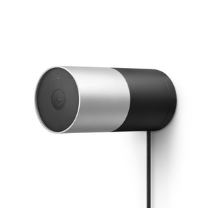 LG Outdoor Cam Plug-in, side exterior, silver color, horizontal cylindrical body, centered camera lens, black color wall mount, embedded power cord at bottom