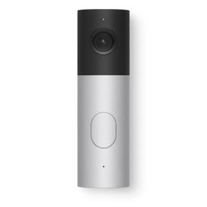 LG Video Doorbell Wired, front exterior: rectangular shape, curved sides. Top section, black color with camera lens. Bottom section, silver color, oval doorbell button in center, microphone hole at bottom