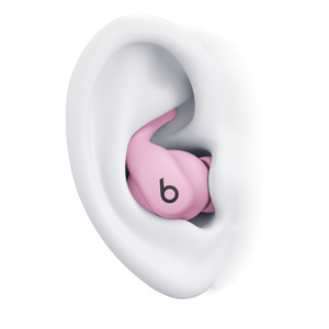 Powerbeats Fit-oortje in de kleur krachtig roze in een oor, met de flexibele wingtip onder de rand van het oor om de goede pasvorm te laten zien. 