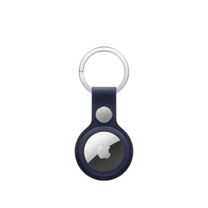 AirTag FineWoven Key Ring in navy, back, covers the entire outer edge of the AirTag, a circular cutout showing the Apple logo on an AirTag