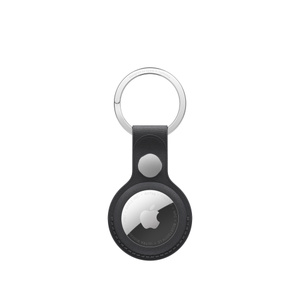 AirTag FineWoven Key Ring in black, back, covers the entire outer edge of the AirTag, a circular cutout showing the Apple logo on an AirTag.