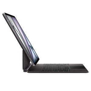Magic Keyboard for iPad Air, side exterior, black color with black color aluminum, black color keys, USB-C port located on bottom-left side near folding area, floating cantilever design, iPad Air attached, landscape orientation, screen tilted back