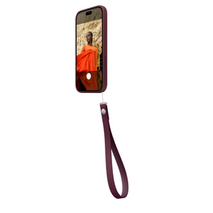 Wrist Strap, burgundy color (dark red), attached to bottom right of iPhone 18 Pro Silicone Case in matching color, side exterior, case covers all outer edges, raised silicone side button and flush Camera Control button, Camera app on screen, Camera Control button active