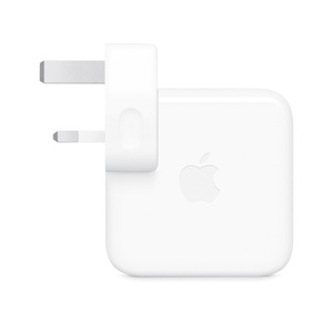 USB-C Power Adapter, side exterior, white color, square shape, rounded corners, folding prongs, removable outlet plug, centered Apple logo