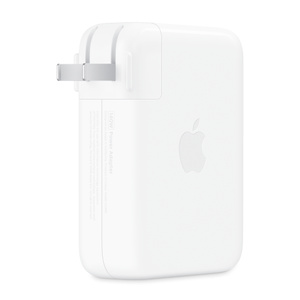 USB-C Power Adapter, back exterior, white color, folding prongs, removable outlet plug, centered Apple logo on side, rectangular shape, rounded corners