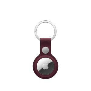 AirTag FineWoven Key Ring, snap closure button, stainless steel key ring, burgundy color (dark red) material covers the outer edge of AirTag, circular cutout, AirTag visible, Apple logo centered