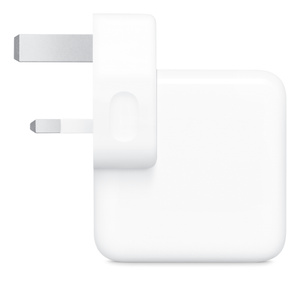 Side view of Power Adapter with pins folded in.