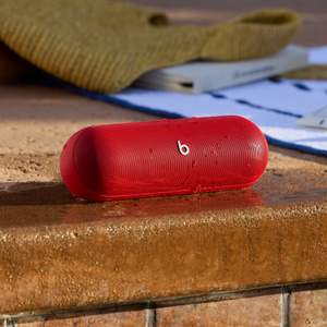 Beats Pill Bluetooth® Speaker in Statement Red shown on outside.