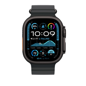 Havsband i svart där man ser 49 mm-boetten, sidoknappen och Digital Crown på Apple Watch