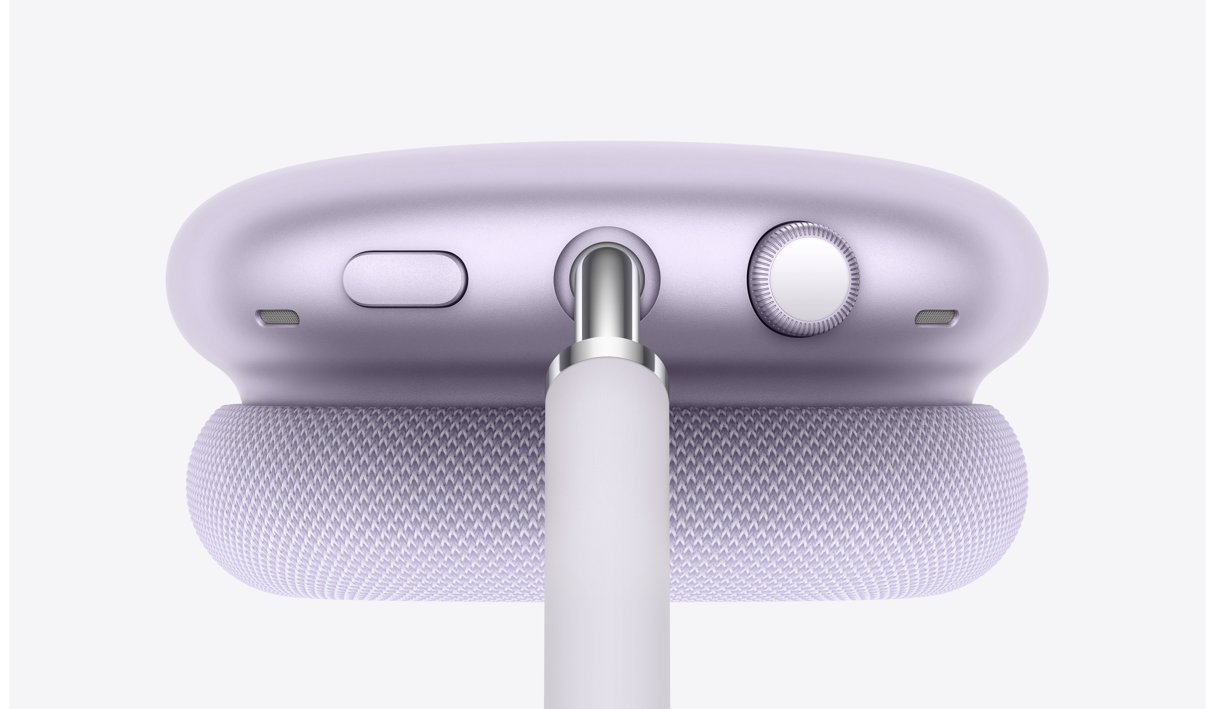 AirPods Max, top of light purple aluminium cup, Noise Control button, Digital Crown, telescoping arm separates the two controls