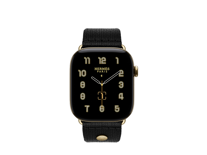 Apple Watch Hermès Series 12 ขนาด 42 มิลลิเมตร, ตัวเรือนไทเทเนียม, สีเรเดียนท์โกลด์, ผิวสัมผัสแบบขัดเงา, จอภาพแบบขอบจรดขอบ, ปุ่มหมุน Digital Crown, เชื่อมต่ออยู่กับสายแบบ Clou de Selle Satin, สี Noir (ดำ)