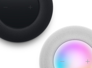 Power off, black display. Plus and minus volume icons on opposite side, within circular display. Glowing circular touch display, with plus and minus volume icons on surface. 