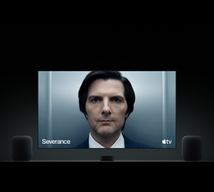 Apple TV 4K, two HomePod speakers, flatscreen television