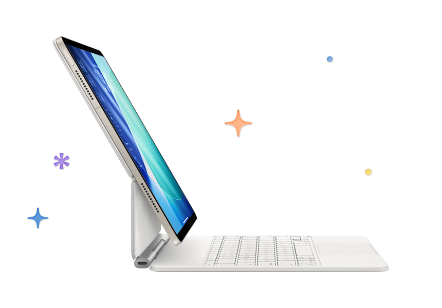 iPad Air color galassia agganciato a una tastiera Magic Keyboard bianca, stelle e puntini multicolore sullo sfondo