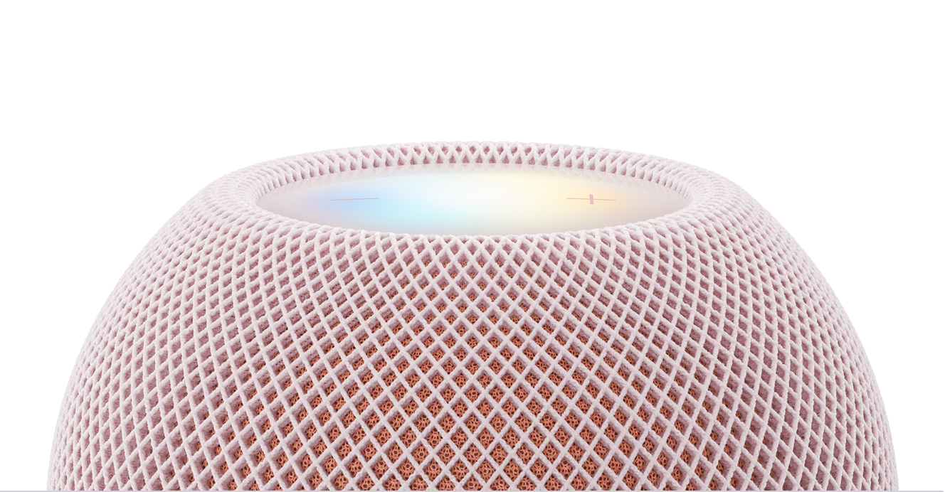 HomePod&nbsp;mini&nbsp;2, pink colour (light pink), exterior fabric, woven acoustic mesh over inner housing. Top exterior, backlit multi‑colour illuminated touch surface with volume controls
