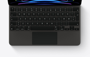 iPad&nbsp;Pro festet til Magic&nbsp;Keyboard i svart, sett ovenfra, som viser tastene og den innebygde styreflaten.