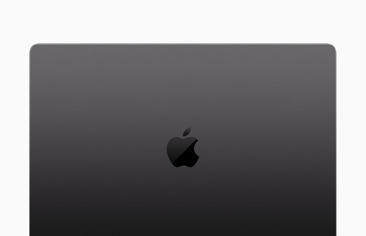 Exterior da parte superior do MacBook Pro de 16 polegadas, fechado, cantos arredondados, logótipo da Apple no centro, em preto sideral