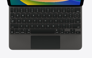 Top-down view of Magic Keyboard in black showing the keys and built-in track pad.