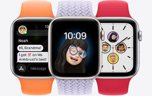 Apple Watch models, displays text message conversation, clock with Memoji face, analogue clock face with Memoji family