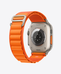 Back of Apple Watch Ultra Titanium Case with Orange Alpine Loop strap, woven textile with titanium G-hook closure and loops