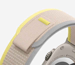 Exterior of Yellow and Beige Trail Loop strap, soft nylon weave with pull tab closure