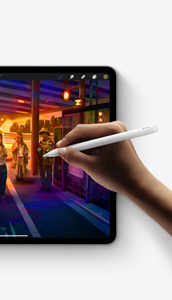 Landscape view, second generation Apple Pencil in hand, editing photo on iPad Pro.