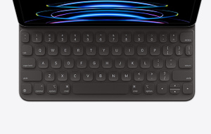 Top-down view of iPad Pro attached to Smart Keyboard Folio in black.
